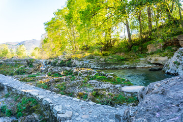 Path near the river Sella in the town of Cangas de Onis. Asturias. Spain