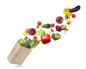 Kraft paper bag with different fruits and vegetables on white background
