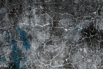 Abstract grunge textured old concrete wall surface with random crack lines