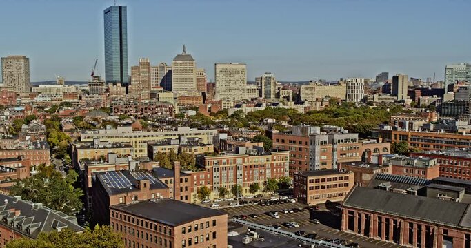 Boston Massachusetts Aerial v288 fly around south end neighborhood capturing historic victorian brick townhouses with downtown cityscape background - Shot with Inspire 2, X7 camera - October 2021