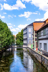 Fototapeta na wymiar old historic houses at idyllic river Gera in Erfurt