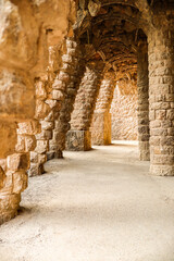 Colorful Colonnaded Pathway in Park Güell in Barcelona. External Columns in European Catalonia.