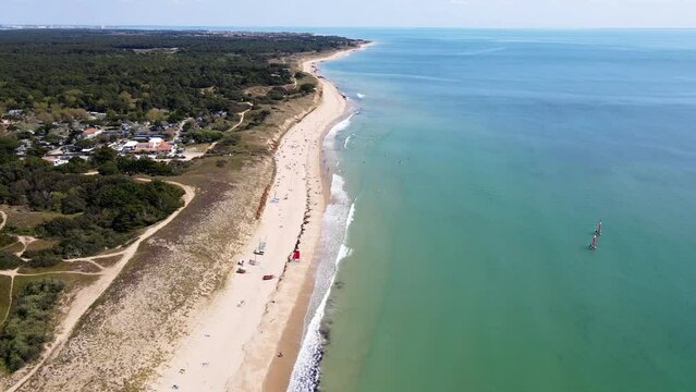 Aerial fly over drone footage of white sand beach of Les Gros Jonc in Le Bois Plage en R&eacute; on island of Re France