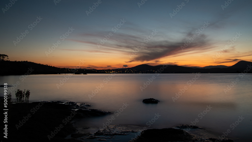 Wall mural sunset over the lake