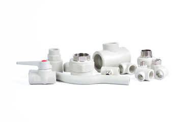 Plumbing fixtures and piping parts plastic fittings isolated on a white background