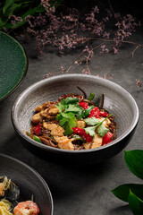 Bowl of asian soba noodles wok with chicken