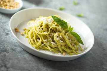 Traditional spaghetti with pesto sauce