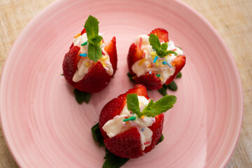 Strawberries stuffed with cream. Traditional Barcelona dessert.