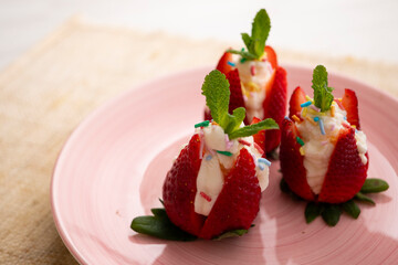 Strawberries stuffed with cream. Traditional Barcelona dessert.