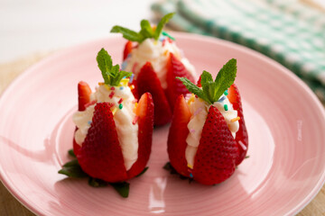 Strawberries stuffed with cream. Traditional Barcelona dessert.