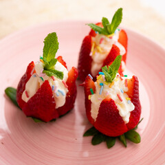 Strawberries stuffed with cream. Traditional Barcelona dessert.