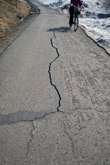 cracked asphalt road surface texture
