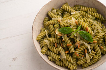 Spirals with broccoli pesto and pine nuts. Italian recipe.