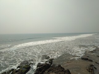 waves crashing on rocks