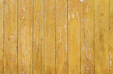 Fototapeta na wymiar yellow wall from old boards