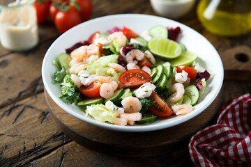 Healthy vegetable salad with shrimps