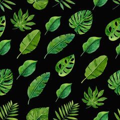 Seamless pattern with watercolor tropical plants on black background.