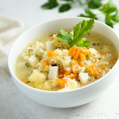 Homemade vegetable soup with millet