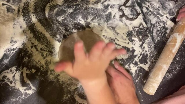 The process of making gingerbread cookies with molds for Easter
