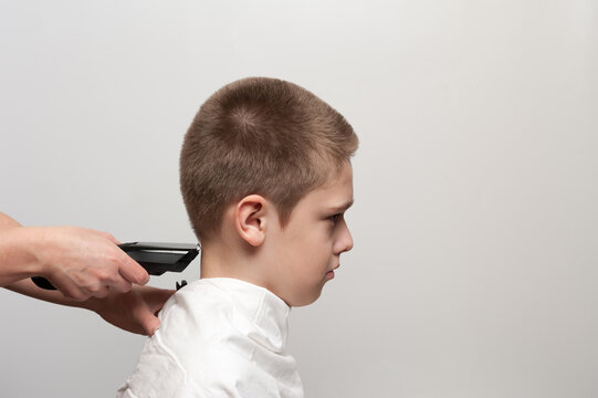 haircut on the back of the head and neck using a hair clipper