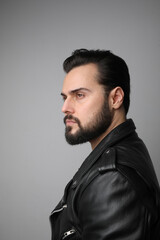 Vertical shot of handsome man looking aside. Mind set helps to achieve success.