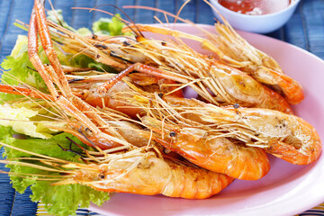 yellow grilled shrimp in a plate
