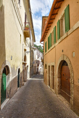 Fototapeta na wymiar A narrow street in Arpino, a small village in the province of Frosinone, Italy.