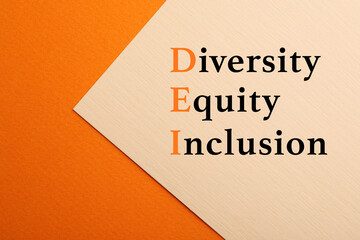 Abbreviation DEI - Diversity, Equity, Inclusion on color background
