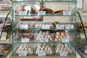 Traditional bakery counter with lots of sweet tasty choices in Medina Cidonia, Cadiz, Andalusia, Spain