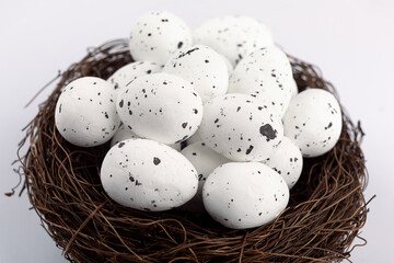 Naklejka na ściany i meble white eggs in a nest