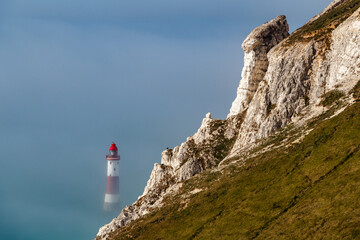 Beachy Head Lighthouse emerging from a sea fog