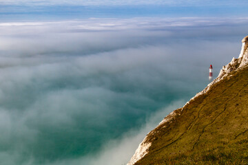 Sea fog rolling towards the cliff edge