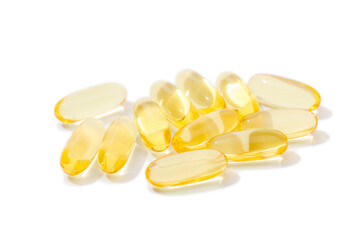 Close up of  oil filled capsules suitable for: fish oil, omega 3, omega 6, omega 9,  vitamin A, vitamin D, vitamin D3, vitamin E - Image