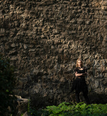 Blonde Witch at Castle Wall