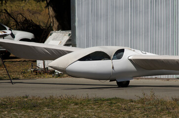 glider plane parked at the debariloche aerodrome. ultralight glider