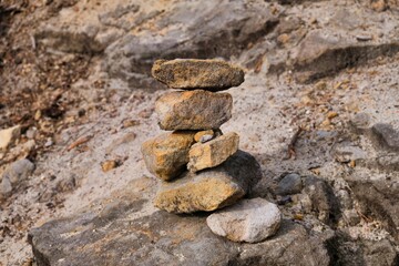 Fototapeta na wymiar Zen meditation with stack of stones. beautiful sandstone