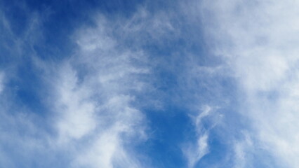 background of blue sky with clouds in clear weather
