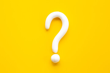 Question mark sign made of plasticine. FAQ and help concept