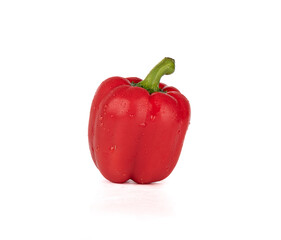 Pod of red sweet pepper with drops of water.