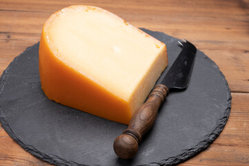 Piece of Dutch Gouda cheese ade from cow milk