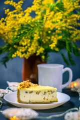 Birthday cheesecake with fresh coffee milk, dark chocolate and mimosa.