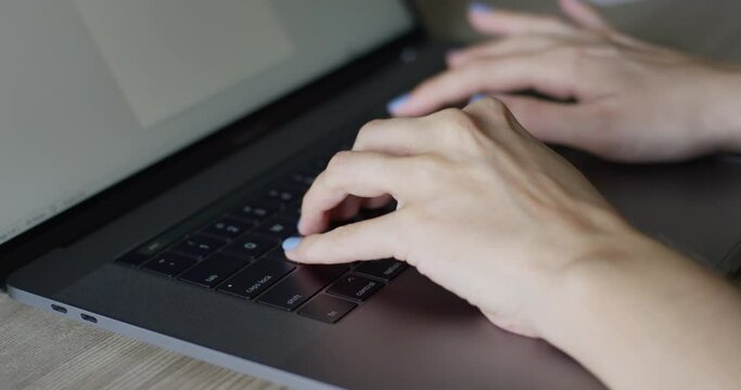Female Hands Typing On Laptop