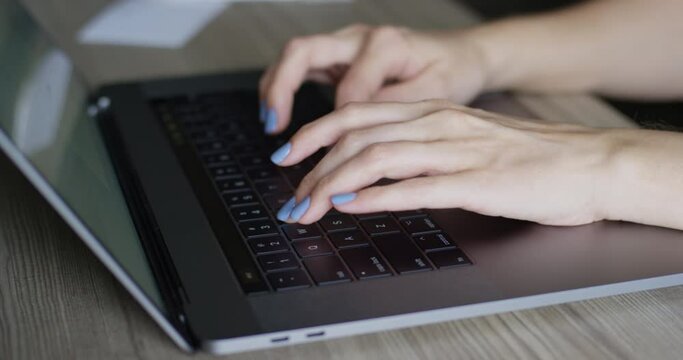 Woman's Hands Working On Laptop