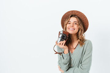 Happy pleased young woman photographer smiling