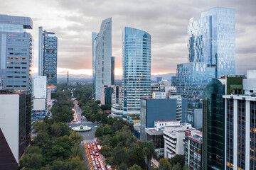 Fototapeta na wymiar Mexico City, CDMX, Mexico, OUT, 17 2021, El Ángel de la Independencia surrounded by several people, Paseo de La Reforma avenue