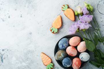 Easter eggs. Dyed Easter eggs with marble stone effect ref and blue color in rustic style on light...