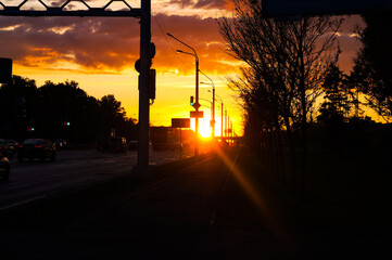 bright evening sunset of summer in the city