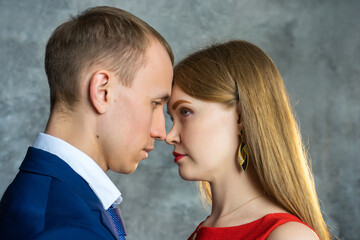 boy and girl are facing each other