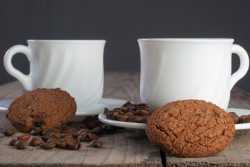 Fresh coffee with biscuits and roasted beans