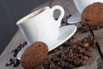 Fresh coffee with biscuits and roasted beans